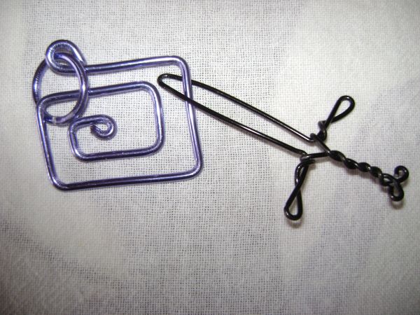 METAL   RING  AND  WIRE  PUZZLE